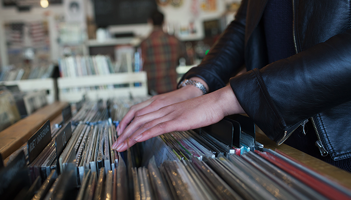 Person selecting vinyls